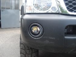 Nissan Patrol Y61 - soczewki LEDowe w zderzaku